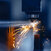 Industrial Manufacturing Lasering metal. Sparks are flying
