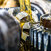 Oil & Gas oil being poured onto cogs